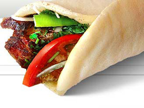 Шаурма в лаваше. Фото с сайта shaurma.armshops.com (С) Шаурма в лаваше. Фото с сайта shaurma.armshops.com (С)
