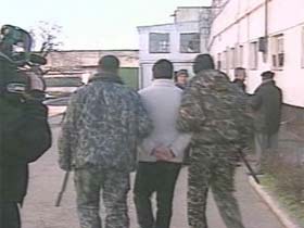 Задержание боевика. Кадр телеканала "Россия" (с) Задержание боевика. Кадр телеканала "Россия" (с)