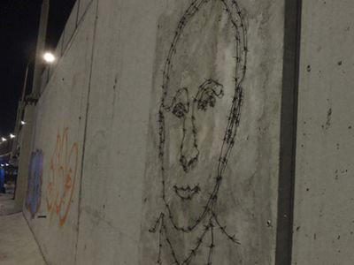 Уличный портрет Путина. Фото: znak.com Уличный портрет Путина. Фото: znak.com