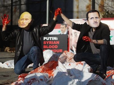 Активисты в масках Путина и Асада на демонстрации в Нью-Йорке, 2012 г. Источник - internacional.elpais.com Активисты в масках Путина и Асада на демонстрации в Нью-Йорке, 2012 г. Источник - internacional.elpais.com