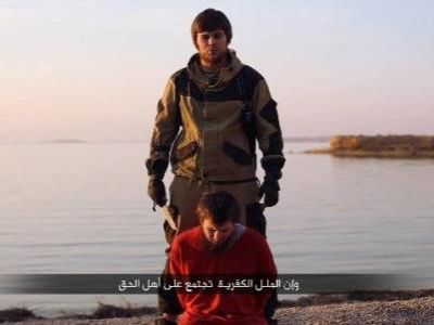 Казнь россиянина террористом ИГ. Фото: newsonline24.com.ua Казнь россиянина террористом ИГ. Фото: newsonline24.com.ua