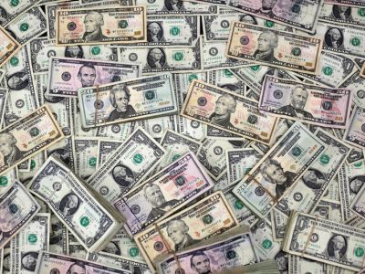 Банкноты доллара США. Фото: Reuters Банкноты доллара США. Фото: Reuters